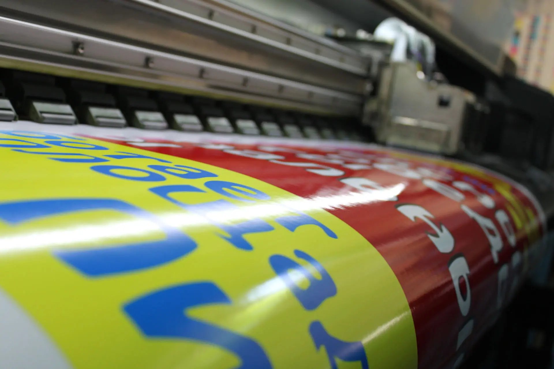colorful glossy vinyl sticker being printed